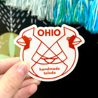 Load image into Gallery viewer, A sticker with a red and white color scheme featuring two cardinals, text 'OHIO', and 
